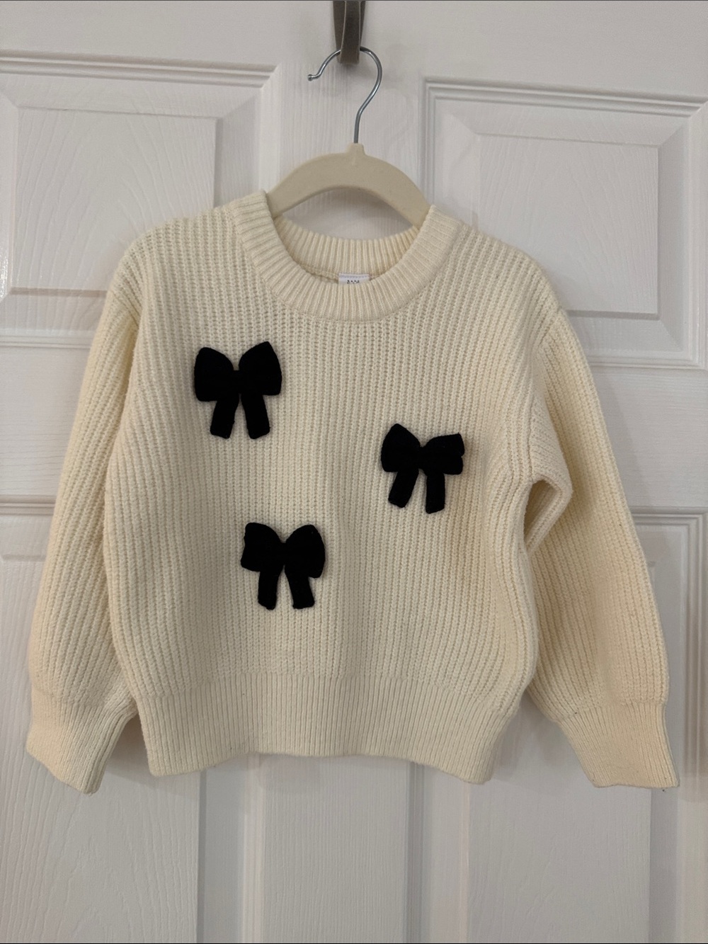GAP Cream Knit Kids Sweater with Black Bow Accents